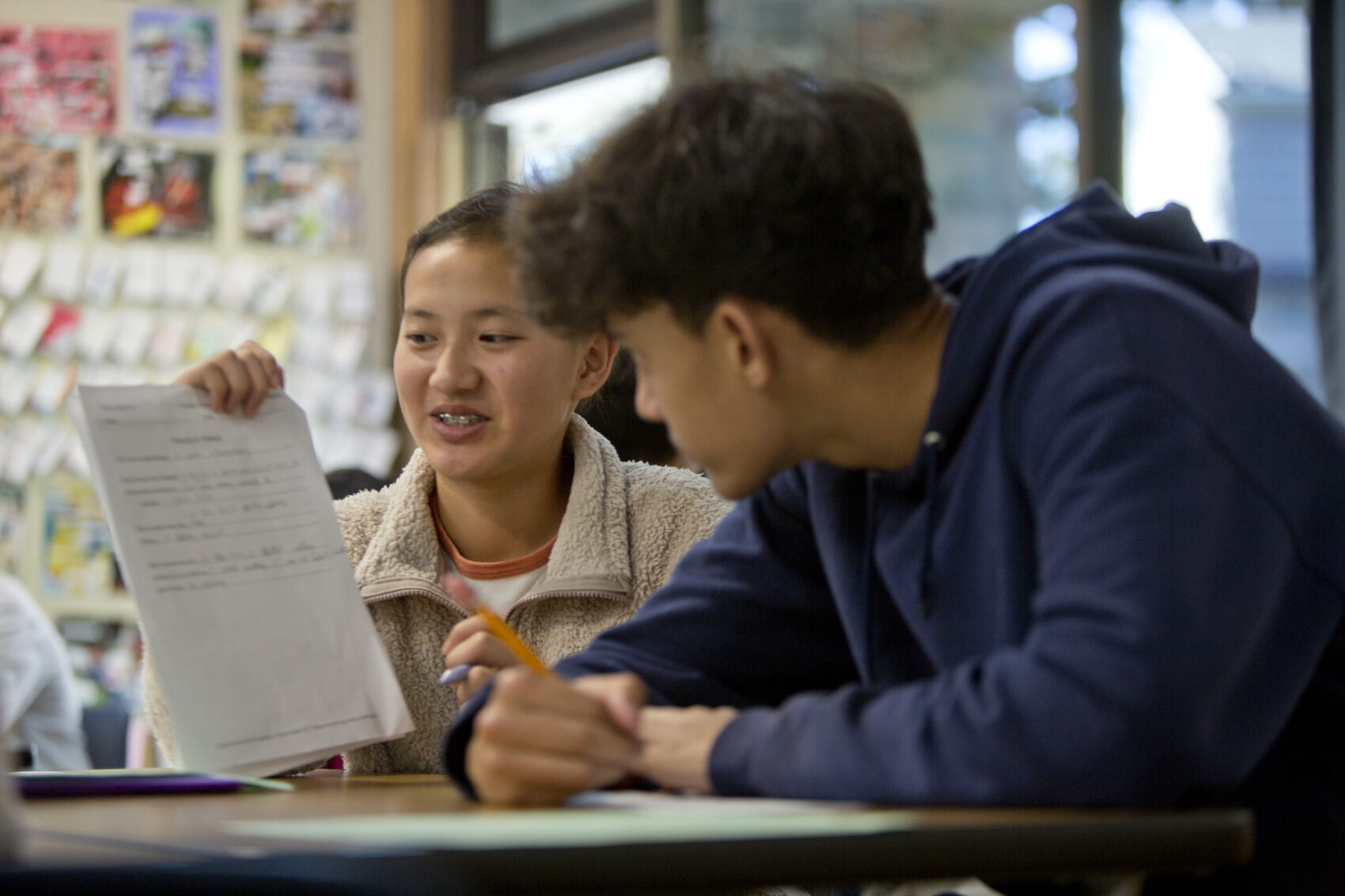 Photo of students discussing Poetry Inside Out lesson at Piedmont Middle School in Piedmont, CA.